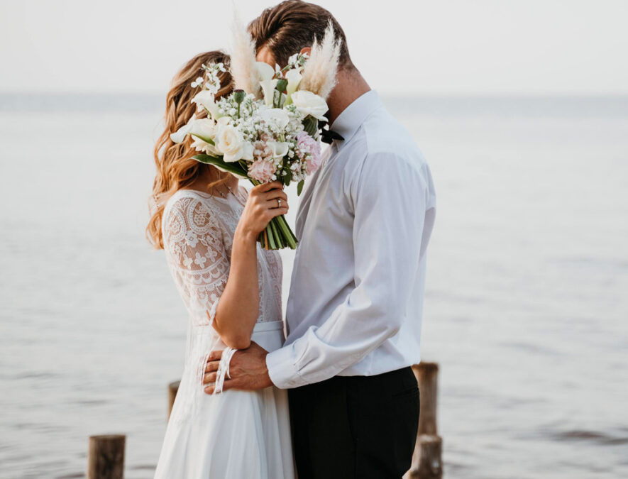 beautiful-couple-having-their-wedding-beach